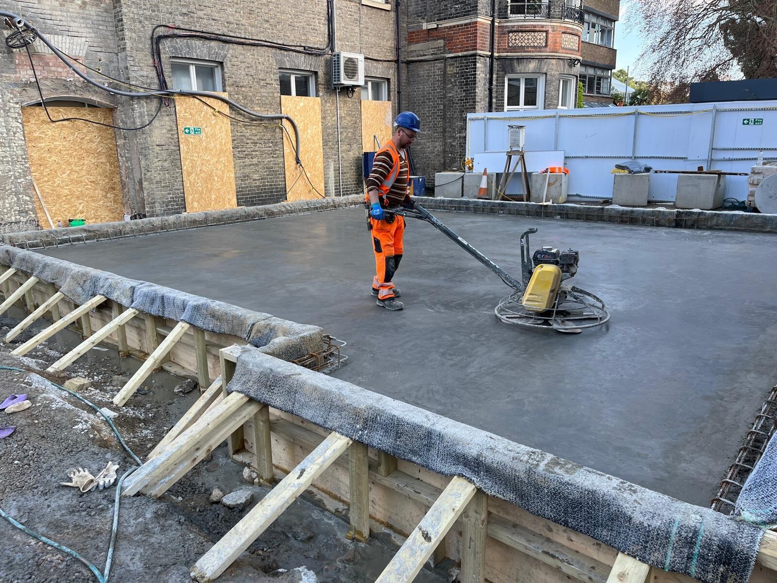 Power float concrete finishing